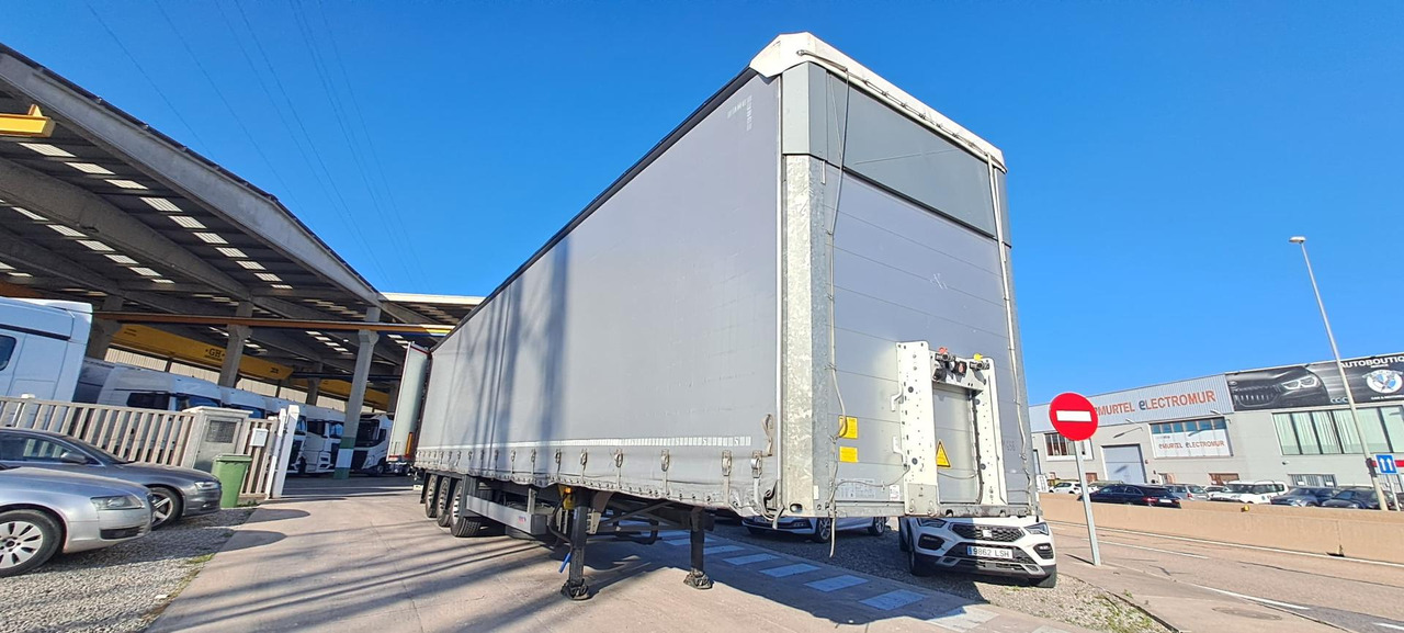 Schmitz Cargobull SCS24/L Varios - Pressukapellipuoliperävaunu: kuva Schmitz Cargobull SCS24/L Varios - Pressukapellipuoliperävaunu Schmitz Cargobull SCS24/L Varios - Pressukapellipuoliperävaunu: kuva Schmitz Cargobull SCS24/L Varios - Pressukapellipuoliperävaunu