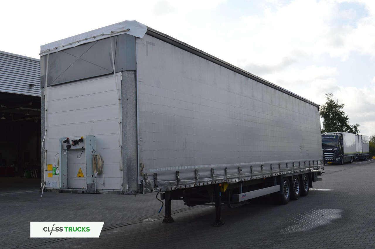 Schmitz Cargobull SCS24/L Varios - Pressukapellipuoliperävaunu: kuva Schmitz Cargobull SCS24/L Varios - Pressukapellipuoliperävaunu Schmitz Cargobull SCS24/L Varios - Pressukapellipuoliperävaunu: kuva Schmitz Cargobull SCS24/L Varios - Pressukapellipuoliperävaunu
