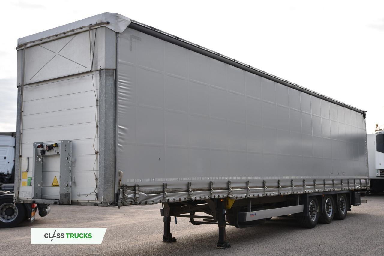 Schmitz Cargobull SCS24/L Varios - Pressukapellipuoliperävaunu: kuva Schmitz Cargobull SCS24/L Varios - Pressukapellipuoliperävaunu Schmitz Cargobull SCS24/L Varios - Pressukapellipuoliperävaunu: kuva Schmitz Cargobull SCS24/L Varios - Pressukapellipuoliperävaunu
