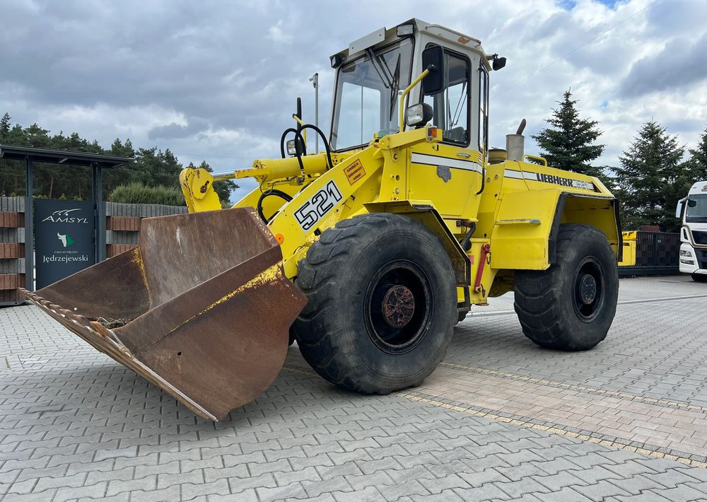 Liebherr L 521 - Pyöräkuormaaja: kuva Liebherr L 521 - Pyöräkuormaaja Liebherr L 521 - Pyöräkuormaaja: kuva Liebherr L 521 - Pyöräkuormaaja