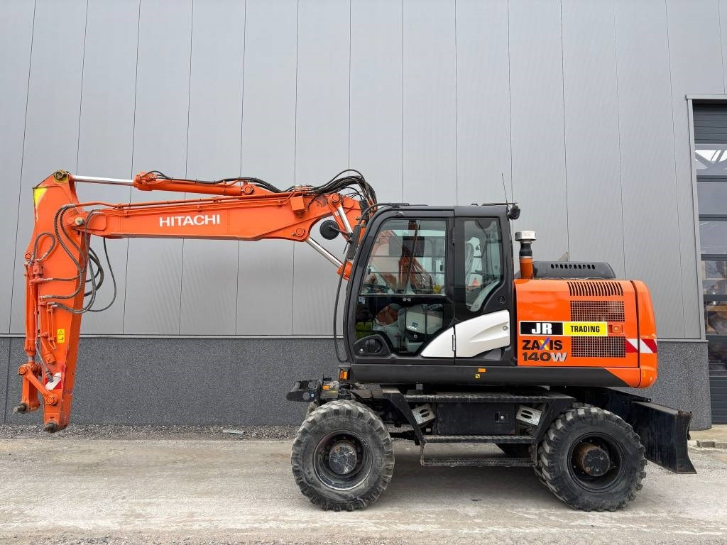 Hitachi ZX 140 W-5B - Pyöräalustainen kaivinkone: kuva Hitachi ZX 140 W-5B - Pyöräalustainen kaivinkone Hitachi ZX 140 W-5B - Pyöräalustainen kaivinkone: kuva Hitachi ZX 140 W-5B - Pyöräalustainen kaivinkone