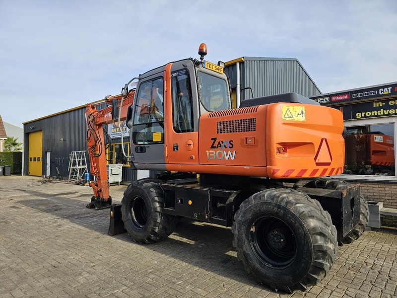 Hitachi ZAXIS 130 W - Pyöräalustainen kaivinkone: kuva Hitachi ZAXIS 130 W - Pyöräalustainen kaivinkone Hitachi ZAXIS 130 W - Pyöräalustainen kaivinkone: kuva Hitachi ZAXIS 130 W - Pyöräalustainen kaivinkone