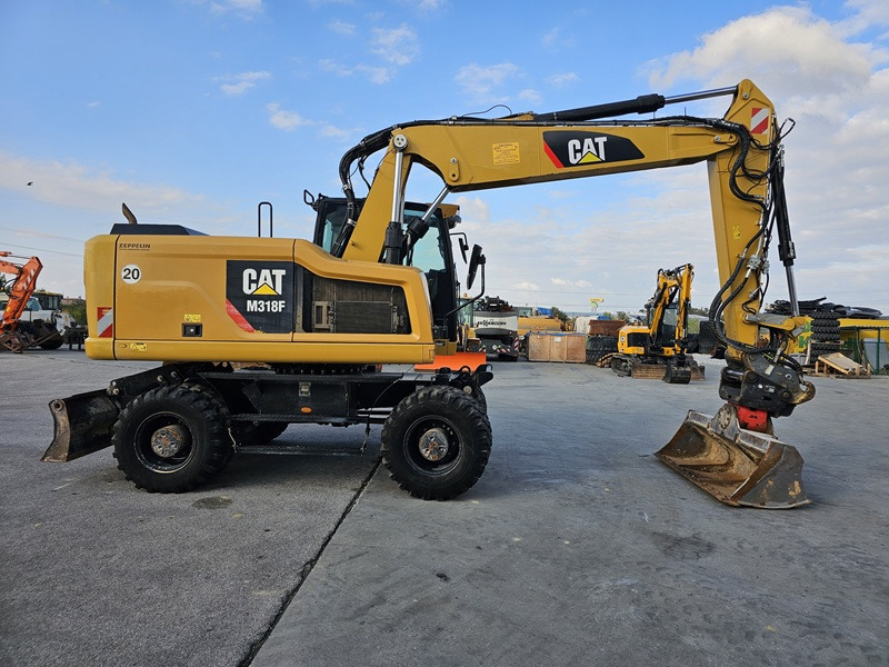 CATERPILLAR M318F - Pyöräalustainen kaivinkone: kuva CATERPILLAR M318F - Pyöräalustainen kaivinkone CATERPILLAR M318F - Pyöräalustainen kaivinkone: kuva CATERPILLAR M318F - Pyöräalustainen kaivinkone
