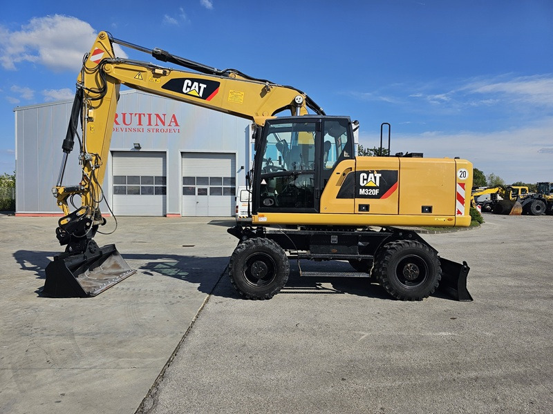 CATERPILLAR M320F - Pyöräalustainen kaivinkone: kuva CATERPILLAR M320F - Pyöräalustainen kaivinkone CATERPILLAR M320F - Pyöräalustainen kaivinkone: kuva CATERPILLAR M320F - Pyöräalustainen kaivinkone