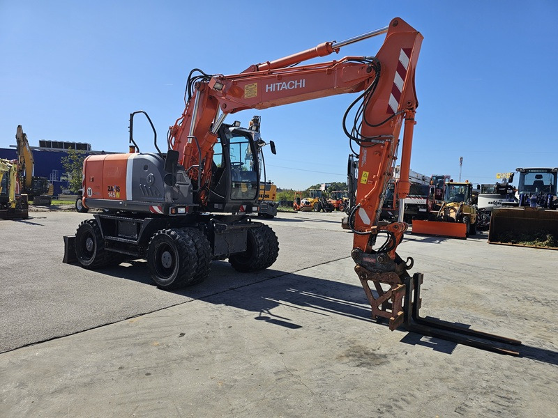 HITACHI ZX145W-3 - Pyöräalustainen kaivinkone: kuva HITACHI ZX145W-3 - Pyöräalustainen kaivinkone HITACHI ZX145W-3 - Pyöräalustainen kaivinkone: kuva HITACHI ZX145W-3 - Pyöräalustainen kaivinkone