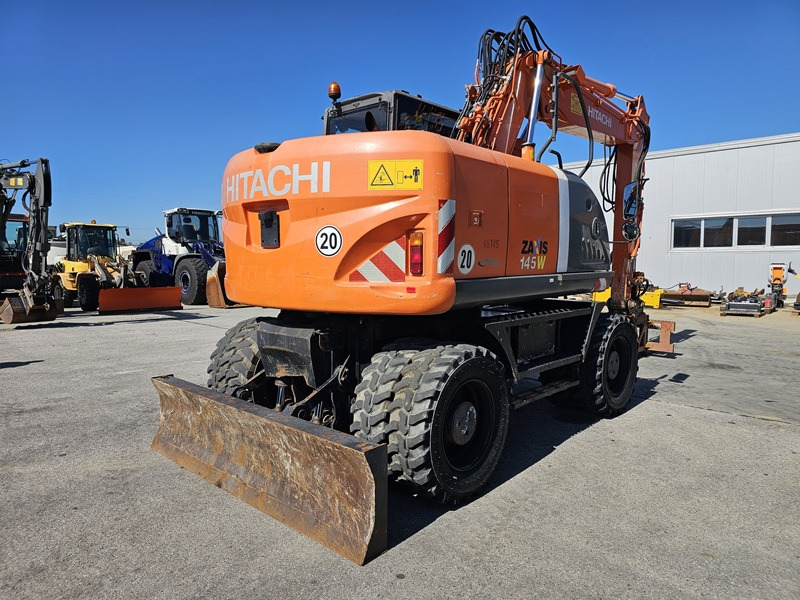 HITACHI ZX145W-3 - Pyöräalustainen kaivinkone: kuva HITACHI ZX145W-3 - Pyöräalustainen kaivinkone HITACHI ZX145W-3 - Pyöräalustainen kaivinkone: kuva HITACHI ZX145W-3 - Pyöräalustainen kaivinkone