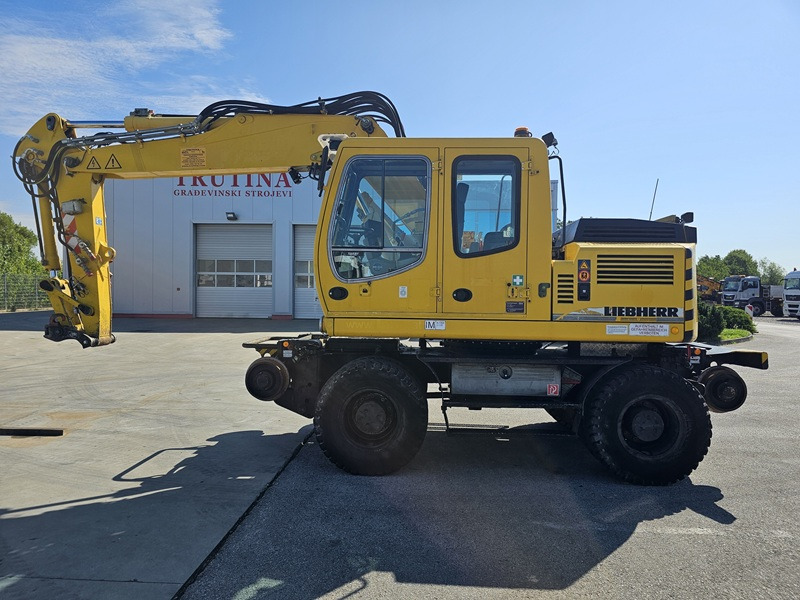 LIEBHERR A900C ZW - Pyöräalustainen kaivinkone: kuva LIEBHERR A900C ZW - Pyöräalustainen kaivinkone LIEBHERR A900C ZW - Pyöräalustainen kaivinkone: kuva LIEBHERR A900C ZW - Pyöräalustainen kaivinkone