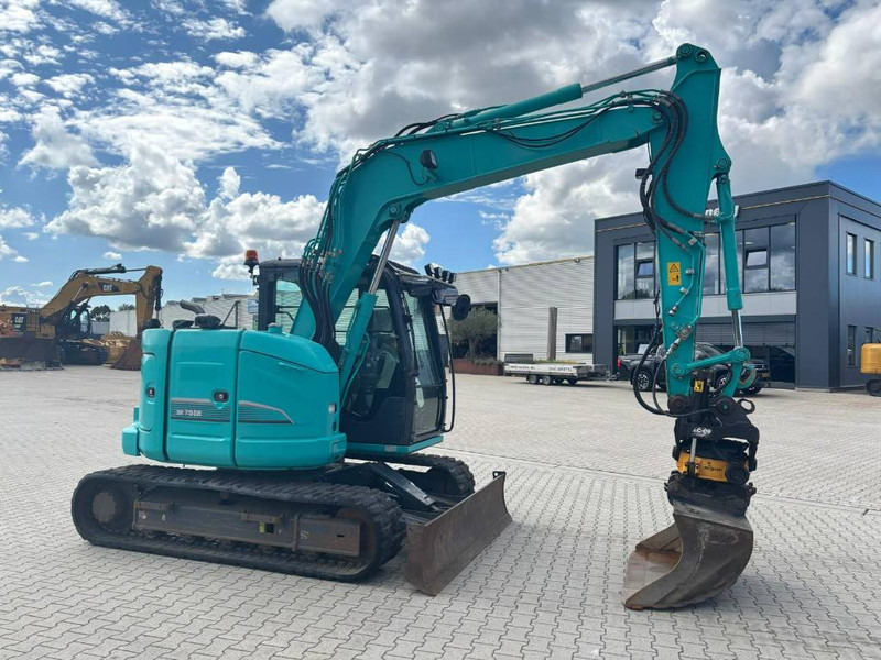 Kobelco SK 75 SR-3E - Minikuormaaja: kuva Kobelco SK 75 SR-3E - Minikuormaaja Kobelco SK 75 SR-3E - Minikuormaaja: kuva Kobelco SK 75 SR-3E - Minikuormaaja