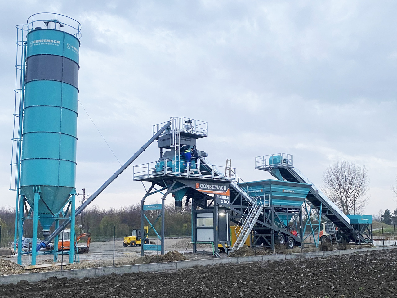 Uusi Betoniasema Constmach Mobile Betonmischanlage mit 100 m³/h: kuva Uusi Betoniasema Constmach Mobile Betonmischanlage mit 100 m³/h Uusi Betoniasema Constmach Mobile Betonmischanlage mit 100 m³/h: kuva Uusi Betoniasema Constmach Mobile Betonmischanlage mit 100 m³/h