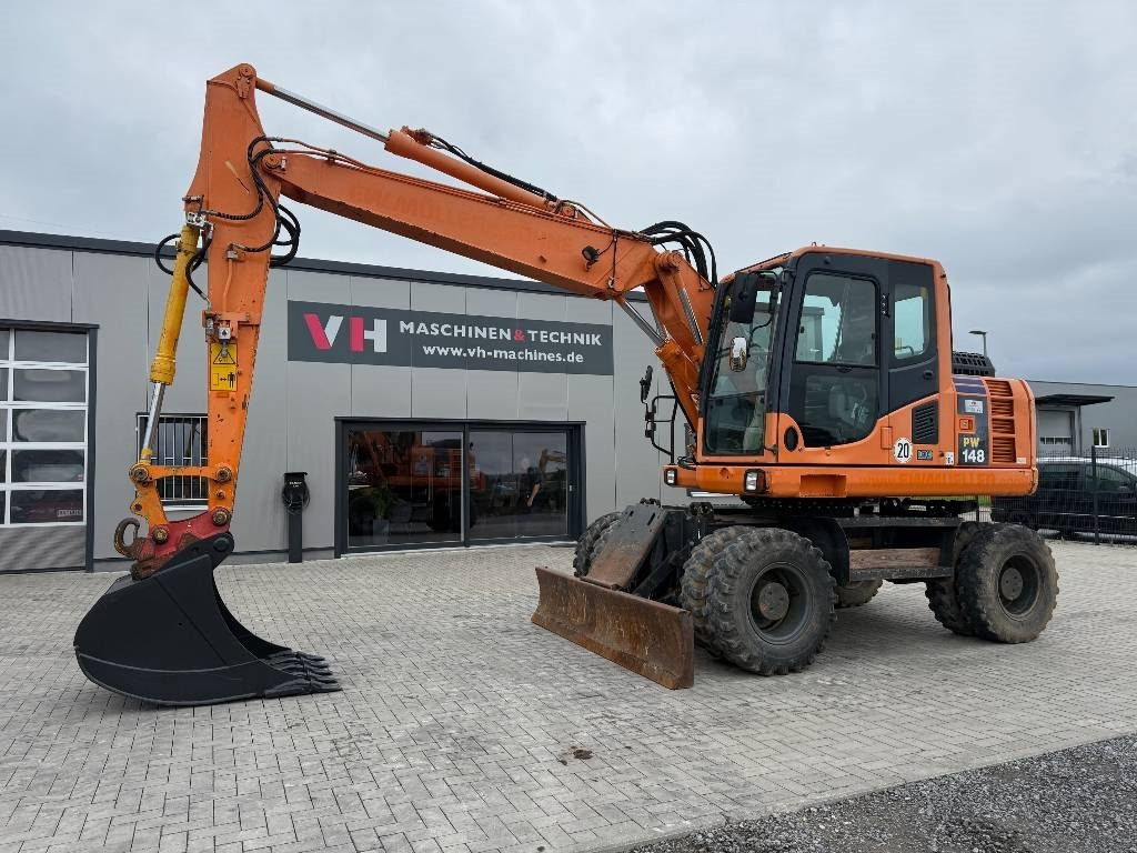 Komatsu PW 148-8 - Pyöräalustainen kaivinkone: kuva Komatsu PW 148-8 - Pyöräalustainen kaivinkone Komatsu PW 148-8 - Pyöräalustainen kaivinkone: kuva Komatsu PW 148-8 - Pyöräalustainen kaivinkone