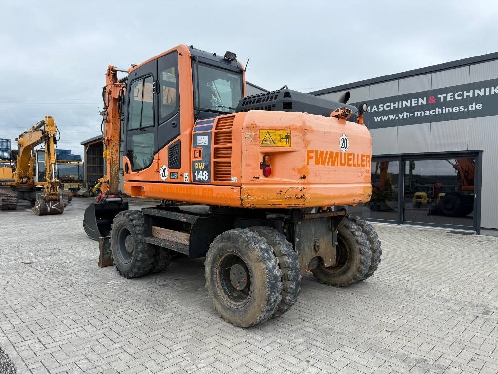 Komatsu PW 148-8 - Pyöräalustainen kaivinkone: kuva Komatsu PW 148-8 - Pyöräalustainen kaivinkone Komatsu PW 148-8 - Pyöräalustainen kaivinkone: kuva Komatsu PW 148-8 - Pyöräalustainen kaivinkone