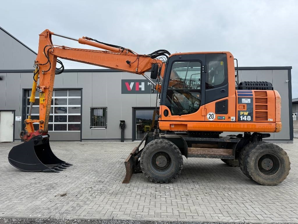 Komatsu PW 148-8 - Pyöräalustainen kaivinkone: kuva Komatsu PW 148-8 - Pyöräalustainen kaivinkone Komatsu PW 148-8 - Pyöräalustainen kaivinkone: kuva Komatsu PW 148-8 - Pyöräalustainen kaivinkone