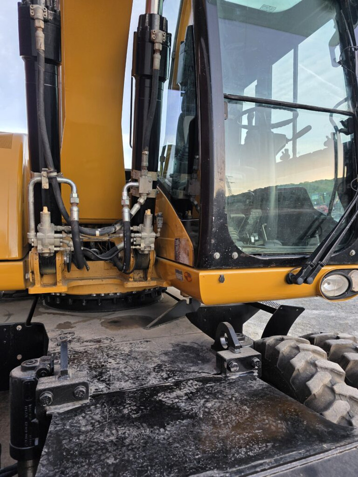 CAT M318D - Pyöräalustainen kaivinkone: kuva CAT M318D - Pyöräalustainen kaivinkone CAT M318D - Pyöräalustainen kaivinkone: kuva CAT M318D - Pyöräalustainen kaivinkone