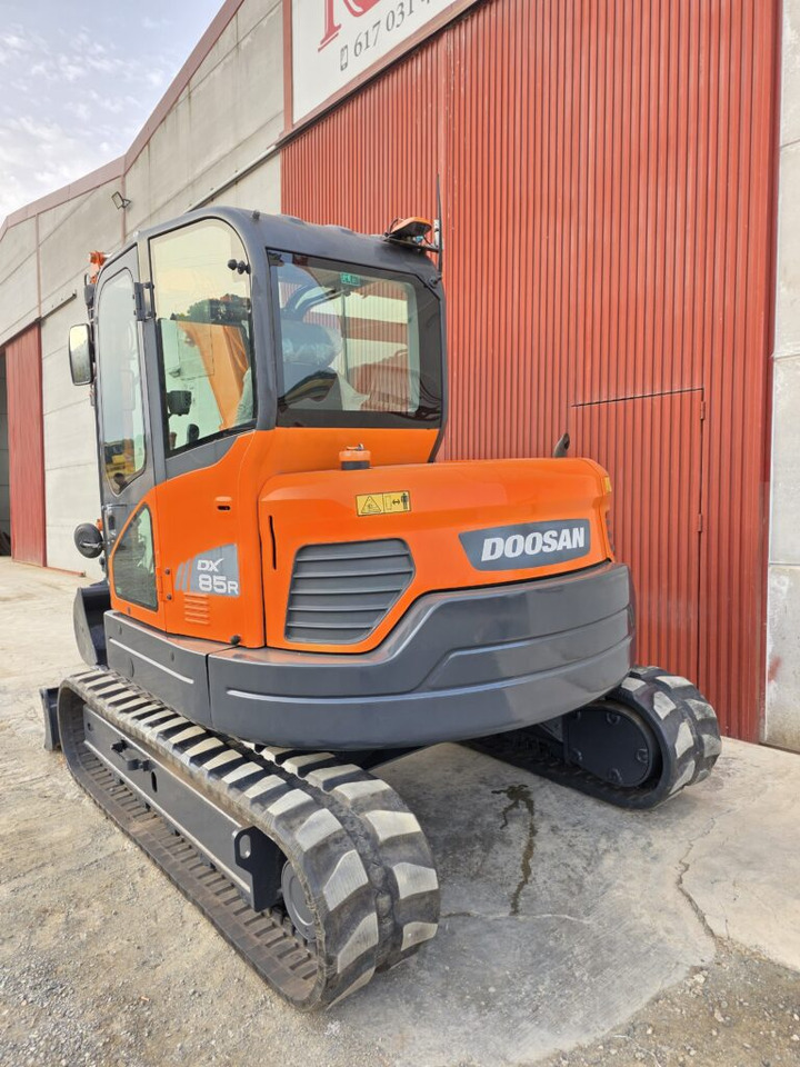 DOOSAN DX85R-3 - Minikuormaaja: kuva DOOSAN DX85R-3 - Minikuormaaja DOOSAN DX85R-3 - Minikuormaaja: kuva DOOSAN DX85R-3 - Minikuormaaja