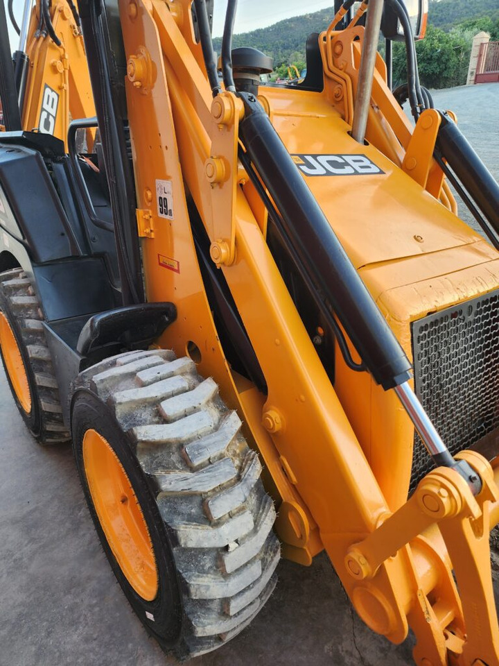 JCB 1CX - Minikuormaaja: kuva JCB 1CX - Minikuormaaja JCB 1CX - Minikuormaaja: kuva JCB 1CX - Minikuormaaja