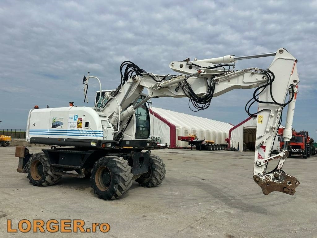 Hitachi ZX 140 W-3 - Pyöräalustainen kaivinkone: kuva Hitachi ZX 140 W-3 - Pyöräalustainen kaivinkone Hitachi ZX 140 W-3 - Pyöräalustainen kaivinkone: kuva Hitachi ZX 140 W-3 - Pyöräalustainen kaivinkone