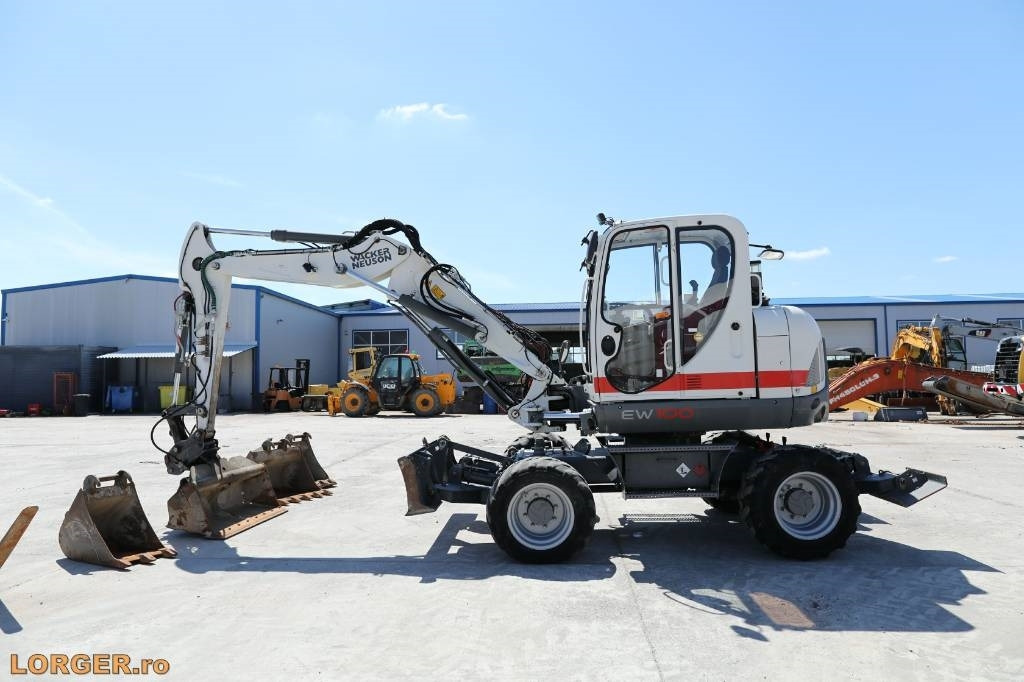 Wacker Neuson EW 100 - Pyöräalustainen kaivinkone: kuva Wacker Neuson EW 100 - Pyöräalustainen kaivinkone Wacker Neuson EW 100 - Pyöräalustainen kaivinkone: kuva Wacker Neuson EW 100 - Pyöräalustainen kaivinkone