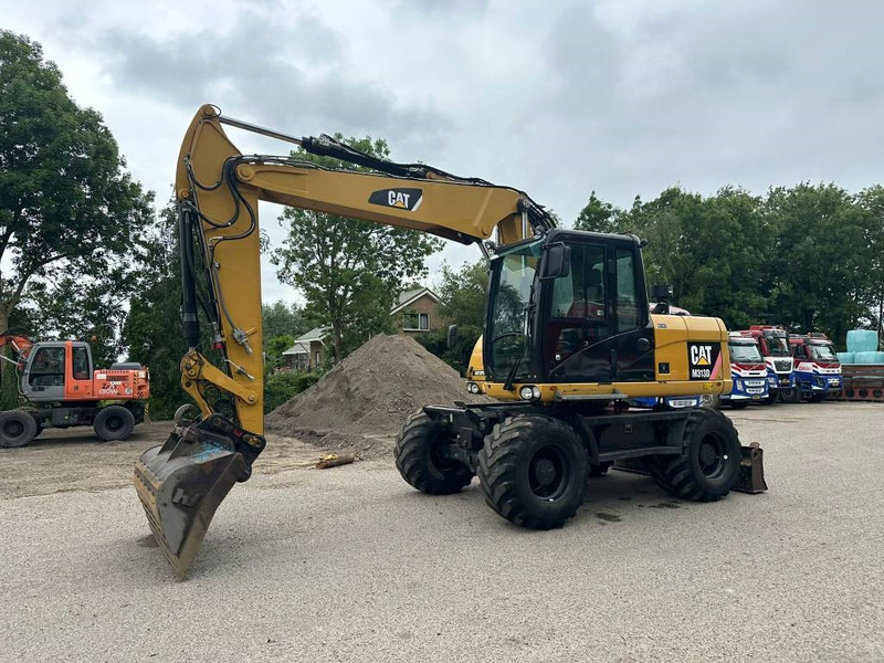 Cat M 313 D VAH - Pyöräalustainen kaivinkone: kuva Cat M 313 D VAH - Pyöräalustainen kaivinkone Cat M 313 D VAH - Pyöräalustainen kaivinkone: kuva Cat M 313 D VAH - Pyöräalustainen kaivinkone