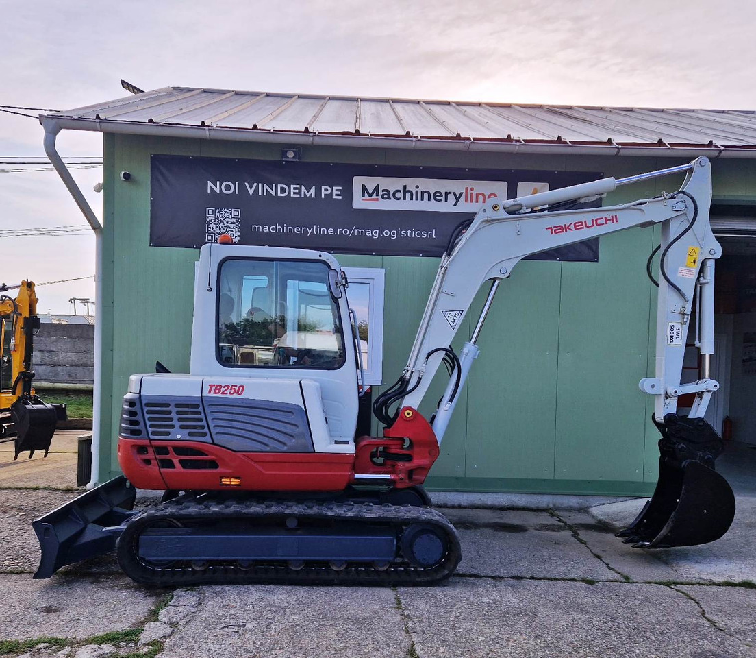 TAKEUCHI TB250 - Minikuormaaja: kuva TAKEUCHI TB250 - Minikuormaaja TAKEUCHI TB250 - Minikuormaaja: kuva TAKEUCHI TB250 - Minikuormaaja