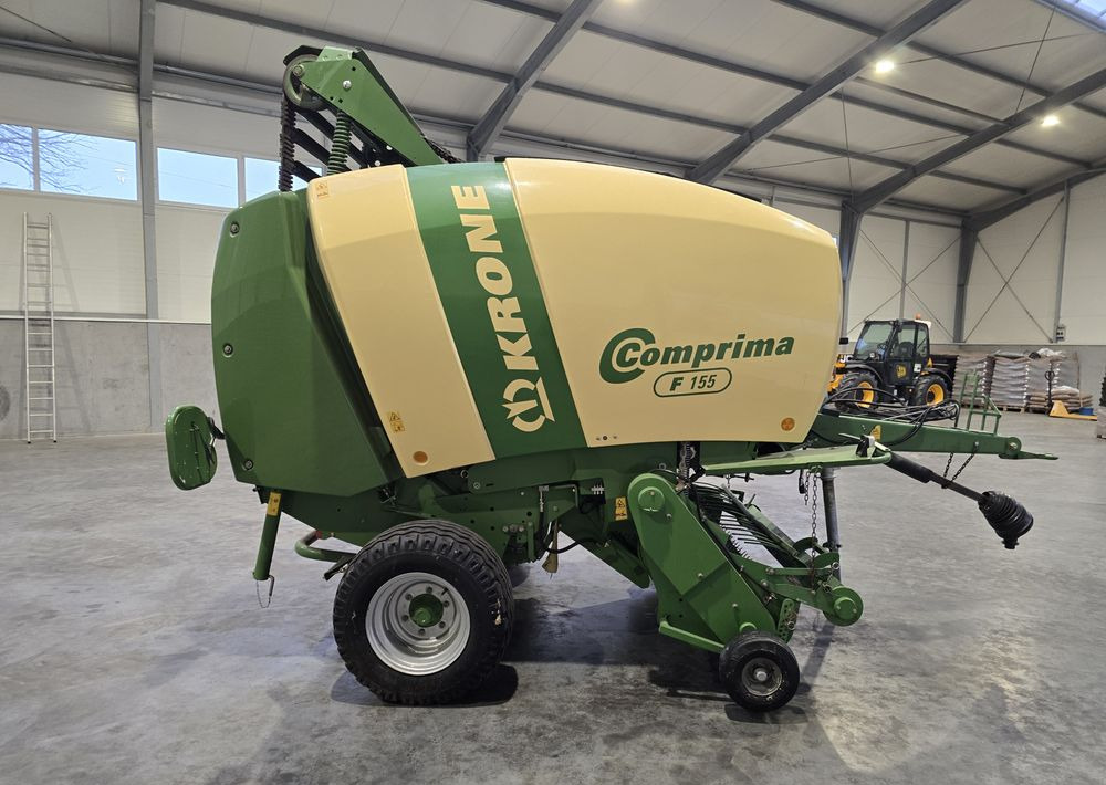 Krone Comprima F 155 - Pyöröpaalain: kuva Krone Comprima F 155 - Pyöröpaalain Krone Comprima F 155 - Pyöröpaalain: kuva Krone Comprima F 155 - Pyöröpaalain
