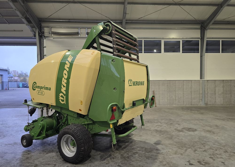 Krone Comprima F 155 - Pyöröpaalain: kuva Krone Comprima F 155 - Pyöröpaalain Krone Comprima F 155 - Pyöröpaalain: kuva Krone Comprima F 155 - Pyöröpaalain