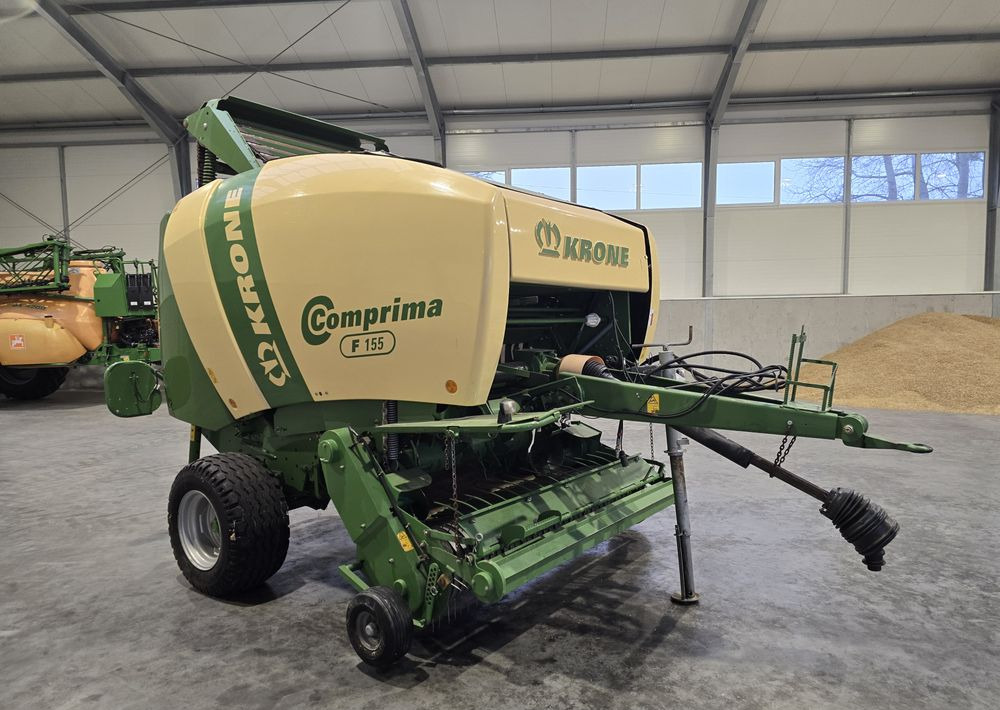 Krone Comprima F 155 - Pyöröpaalain: kuva Krone Comprima F 155 - Pyöröpaalain Krone Comprima F 155 - Pyöröpaalain: kuva Krone Comprima F 155 - Pyöröpaalain