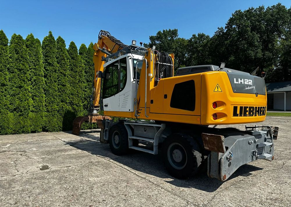 Liebherr LH22 M - Pyöräalustainen kaivinkone: kuva Liebherr LH22 M - Pyöräalustainen kaivinkone Liebherr LH22 M - Pyöräalustainen kaivinkone: kuva Liebherr LH22 M - Pyöräalustainen kaivinkone