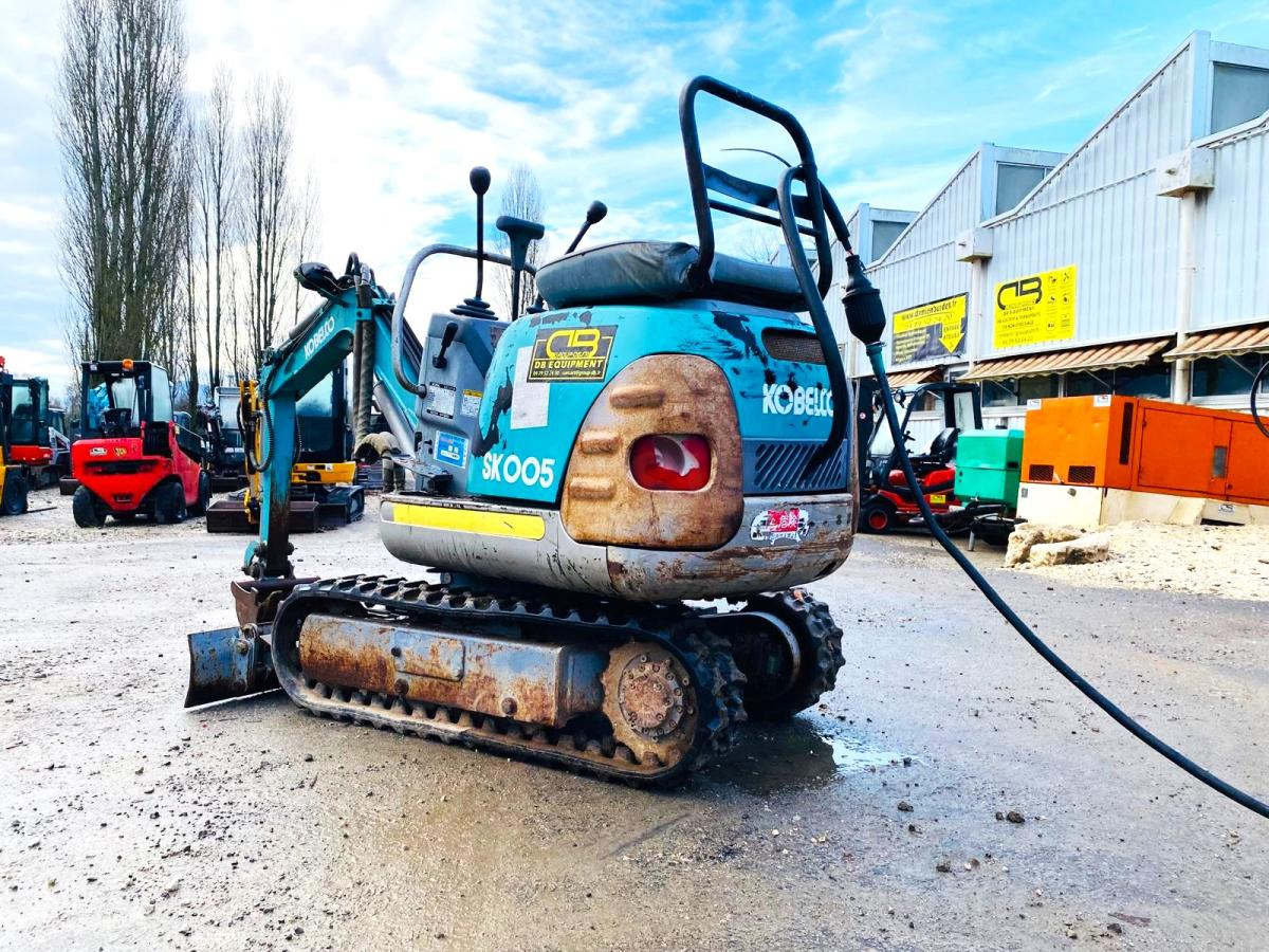 KOBELCO Mini pelle électrique SK007 - Minikuormaaja: kuva KOBELCO Mini pelle électrique SK007 - Minikuormaaja KOBELCO Mini pelle électrique SK007 - Minikuormaaja: kuva KOBELCO Mini pelle électrique SK007 - Minikuormaaja