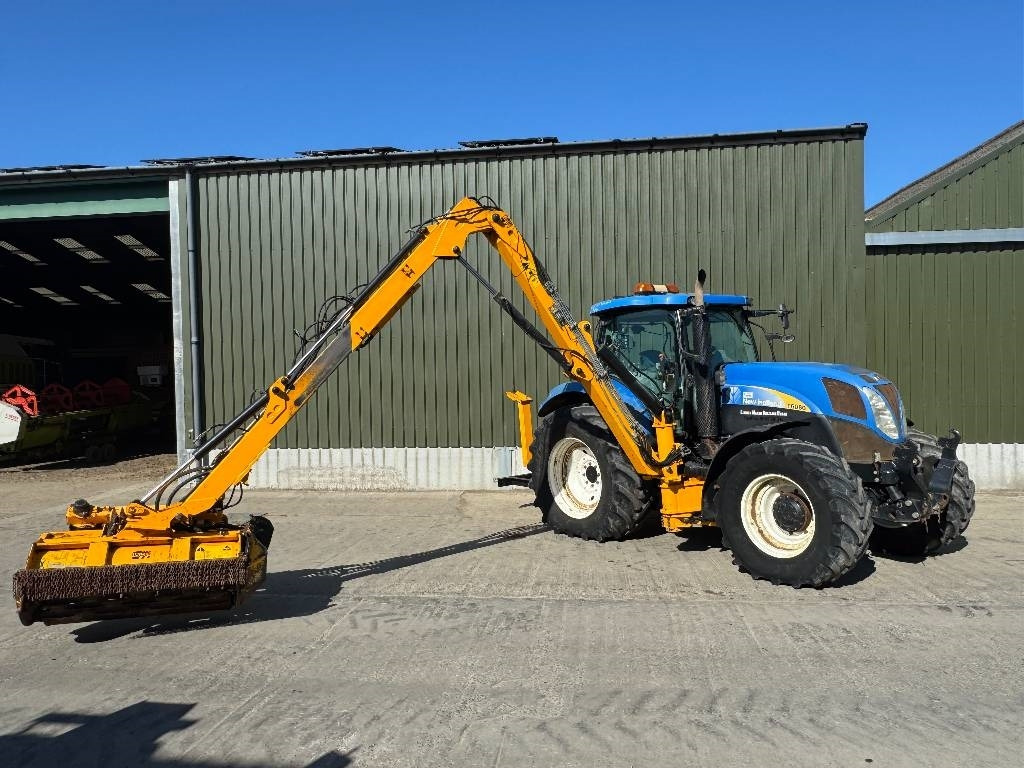New Holland T6080 c/w Herder Cavalier - Kesantomurskain/ Vesakkomurskain: kuva New Holland T6080 c/w Herder Cavalier - Kesantomurskain/ Vesakkomurskain New Holland T6080 c/w Herder Cavalier - Kesantomurskain/ Vesakkomurskain: kuva New Holland T6080 c/w Herder Cavalier - Kesantomurskain/ Vesakkomurskain