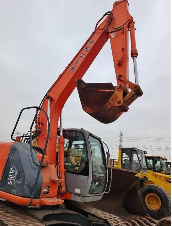 Hitachi ZX 135 US - Telakaivukone: kuva Hitachi ZX 135 US - Telakaivukone Hitachi ZX 135 US - Telakaivukone: kuva Hitachi ZX 135 US - Telakaivukone