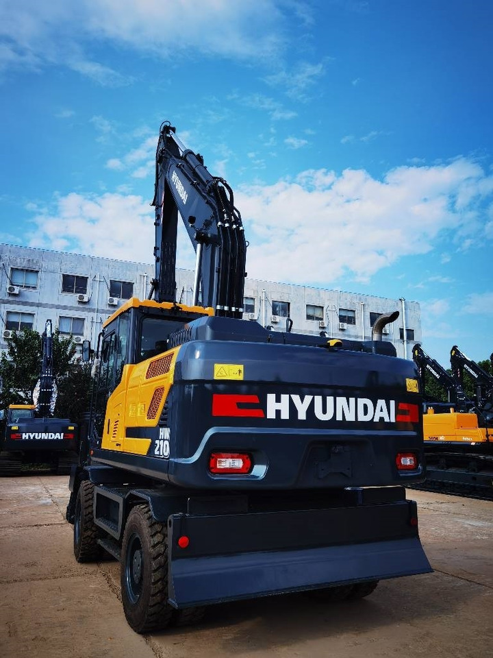 Hyundai 210W-9 - Pyöräalustainen kaivinkone: kuva Hyundai 210W-9 - Pyöräalustainen kaivinkone Hyundai 210W-9 - Pyöräalustainen kaivinkone: kuva Hyundai 210W-9 - Pyöräalustainen kaivinkone
