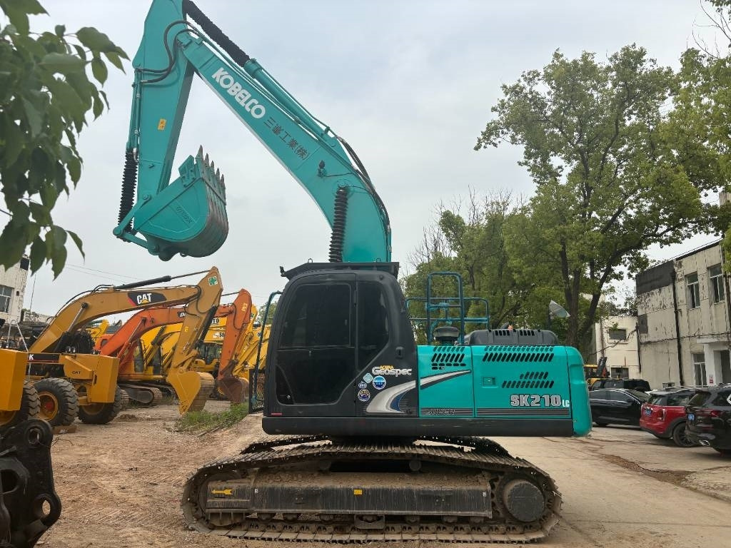 Kobelco SK 210 - Telakaivukone: kuva Kobelco SK 210 - Telakaivukone Kobelco SK 210 - Telakaivukone: kuva Kobelco SK 210 - Telakaivukone