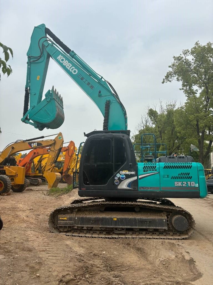 Kobelco SK 210 - Telakaivukone: kuva Kobelco SK 210 - Telakaivukone Kobelco SK 210 - Telakaivukone: kuva Kobelco SK 210 - Telakaivukone