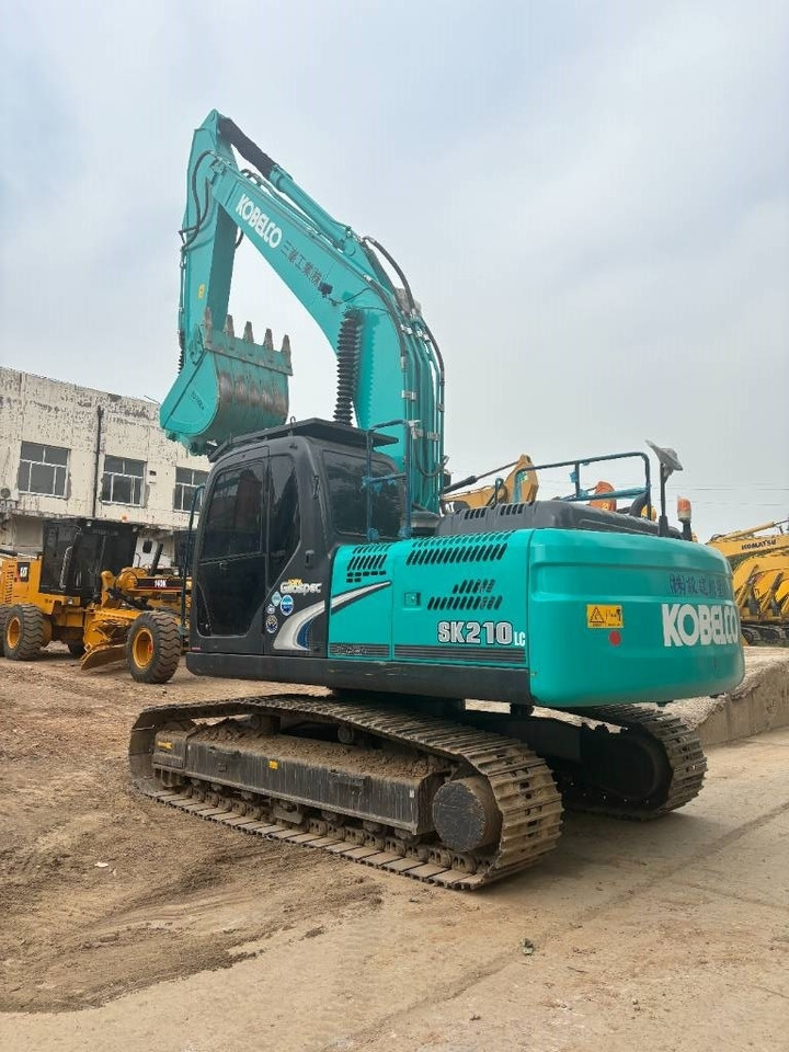 Kobelco SK 210 - Telakaivukone: kuva Kobelco SK 210 - Telakaivukone Kobelco SK 210 - Telakaivukone: kuva Kobelco SK 210 - Telakaivukone