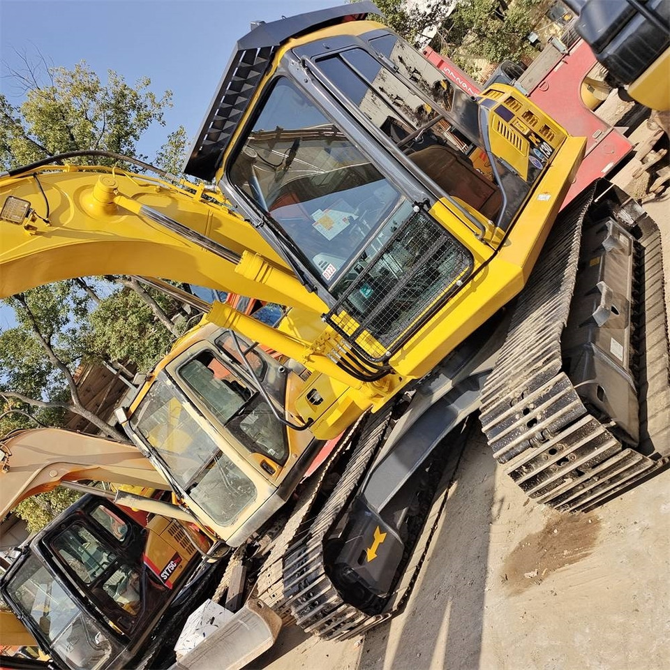 Komatsu PC 130 - Telakaivukone: kuva Komatsu PC 130 - Telakaivukone Komatsu PC 130 - Telakaivukone: kuva Komatsu PC 130 - Telakaivukone