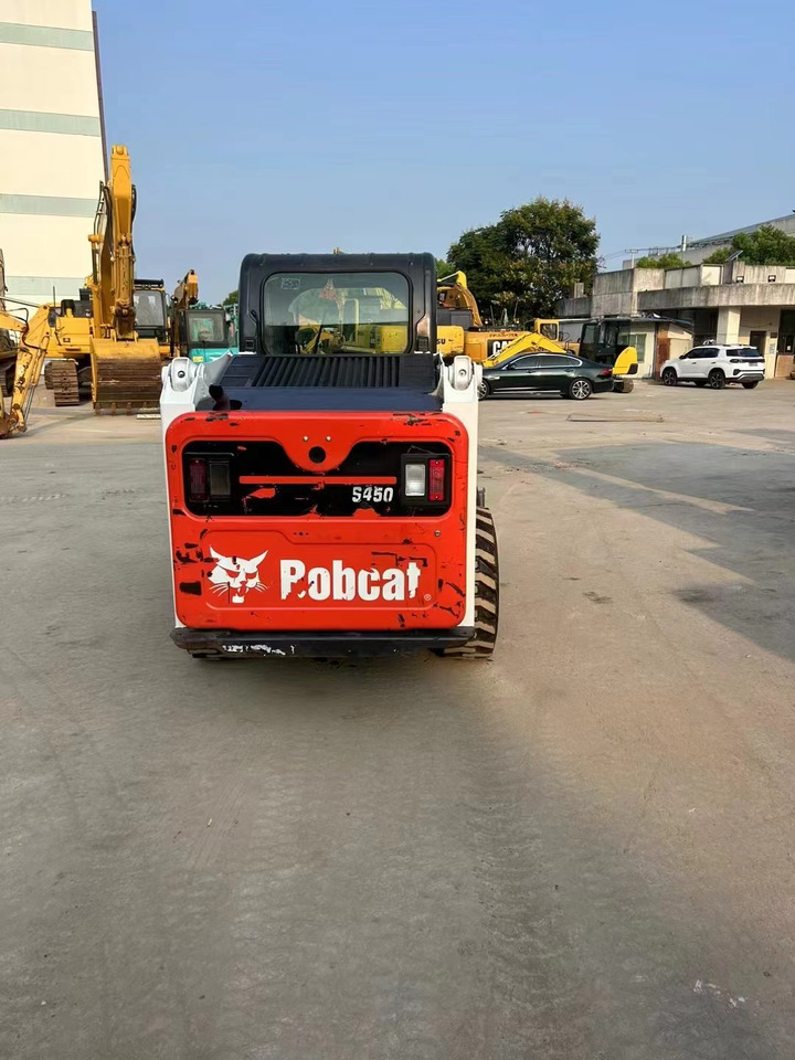 Bobcat S450 - Liukuohjattu kuormaaja: kuva Bobcat S450 - Liukuohjattu kuormaaja Bobcat S450 - Liukuohjattu kuormaaja: kuva Bobcat S450 - Liukuohjattu kuormaaja