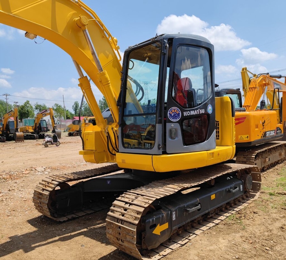 Komatsu PC128US - Telakaivukone: kuva Komatsu PC128US - Telakaivukone Komatsu PC128US - Telakaivukone: kuva Komatsu PC128US - Telakaivukone