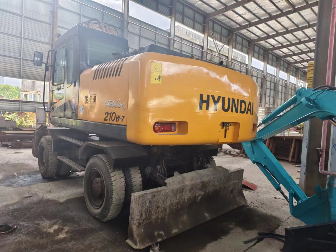 HYUNDAI 210W-7 - Pyöräalustainen kaivinkone: kuva HYUNDAI 210W-7 - Pyöräalustainen kaivinkone HYUNDAI 210W-7 - Pyöräalustainen kaivinkone: kuva HYUNDAI 210W-7 - Pyöräalustainen kaivinkone