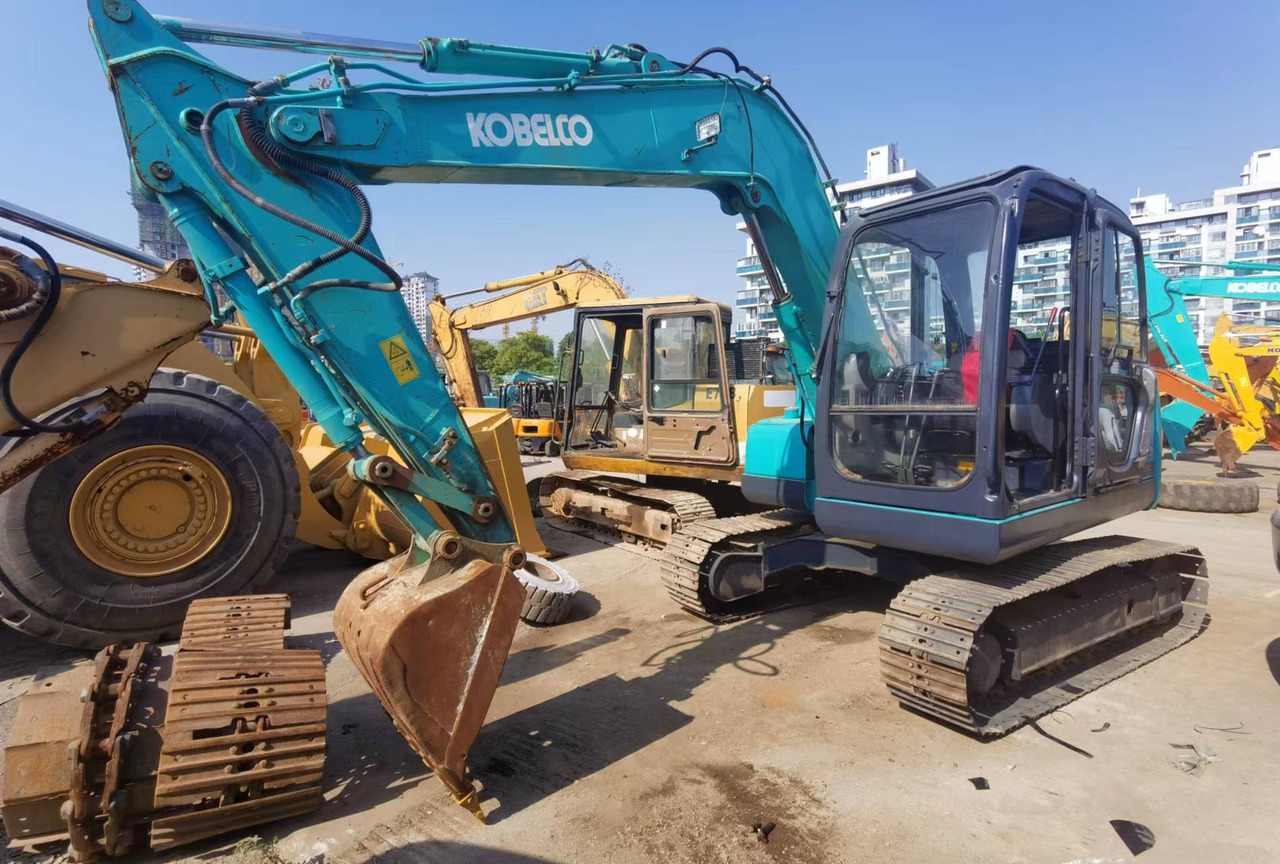 KOBELCO SK75 - Minikuormaaja: kuva KOBELCO SK75 - Minikuormaaja KOBELCO SK75 - Minikuormaaja: kuva KOBELCO SK75 - Minikuormaaja