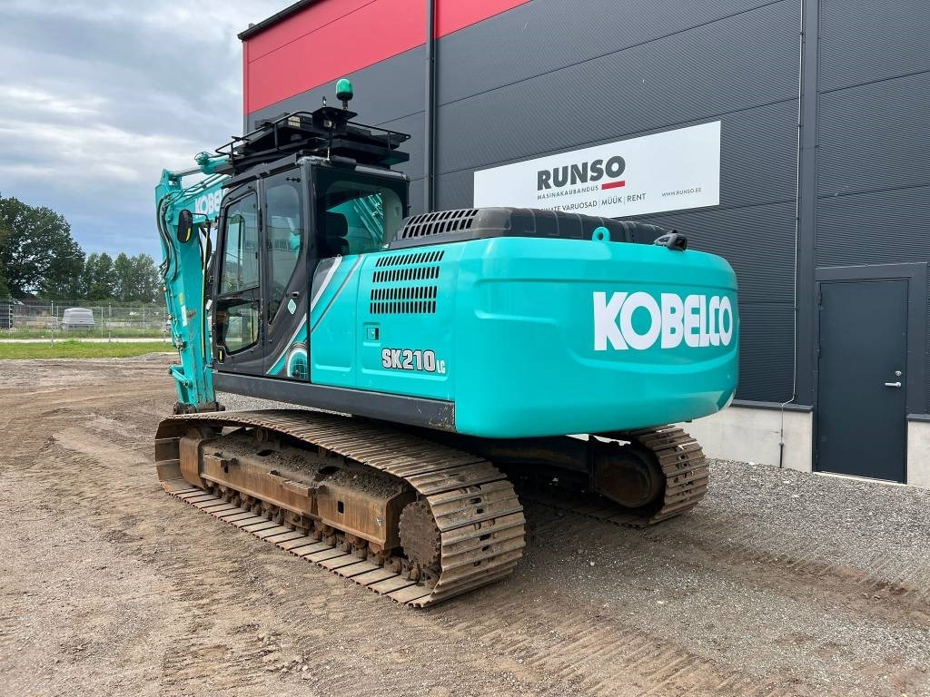 Kobelco SK 210 LC-10 - Telakaivukone: kuva Kobelco SK 210 LC-10 - Telakaivukone Kobelco SK 210 LC-10 - Telakaivukone: kuva Kobelco SK 210 LC-10 - Telakaivukone