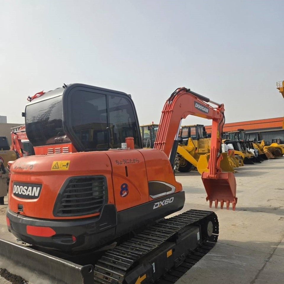 Doosan DX 60  - Minikuormaaja: kuva Doosan DX 60  - Minikuormaaja Doosan DX 60  - Minikuormaaja: kuva Doosan DX 60  - Minikuormaaja