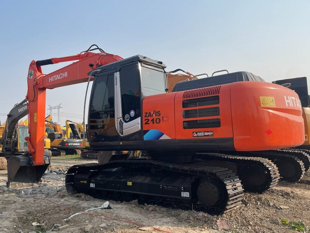 Hitachi ZX 210 - Telakaivukone: kuva Hitachi ZX 210 - Telakaivukone Hitachi ZX 210 - Telakaivukone: kuva Hitachi ZX 210 - Telakaivukone