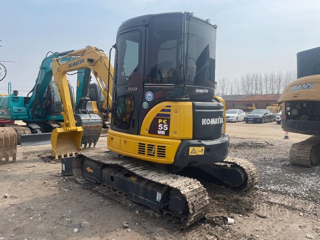 Komatsu PC 55 - Minikuormaaja: kuva Komatsu PC 55 - Minikuormaaja Komatsu PC 55 - Minikuormaaja: kuva Komatsu PC 55 - Minikuormaaja