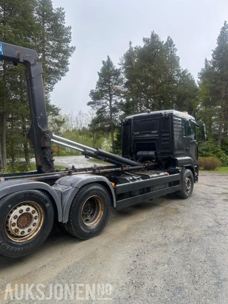 2007 MAN TGA 26.440 6X2-2 BL - Koukkulava kuorma-auto: kuva 2007 MAN TGA 26.440 6X2-2 BL - Koukkulava kuorma-auto 2007 MAN TGA 26.440 6X2-2 BL - Koukkulava kuorma-auto: kuva 2007 MAN TGA 26.440 6X2-2 BL - Koukkulava kuorma-auto