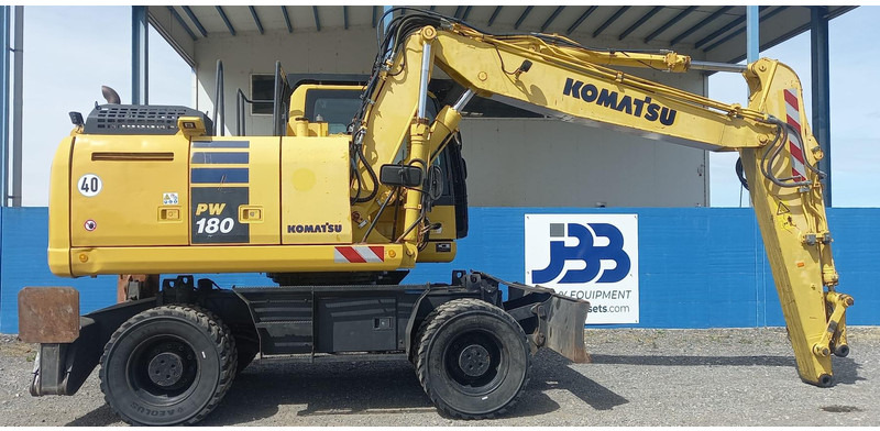 Komatsu PW180-10 - Pyöräalustainen kaivinkone: kuva Komatsu PW180-10 - Pyöräalustainen kaivinkone Komatsu PW180-10 - Pyöräalustainen kaivinkone: kuva Komatsu PW180-10 - Pyöräalustainen kaivinkone