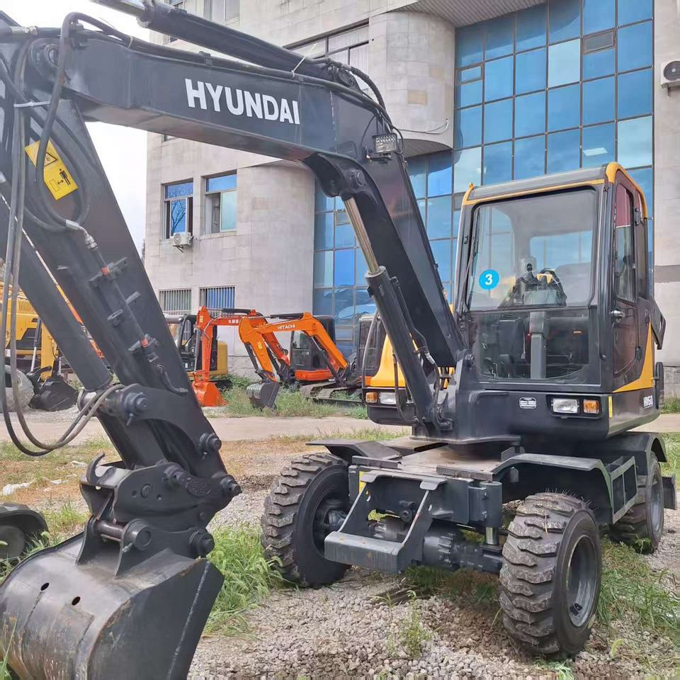 Hyundai HW60 excavator - Pyöräalustainen kaivinkone: kuva Hyundai HW60 excavator - Pyöräalustainen kaivinkone Hyundai HW60 excavator - Pyöräalustainen kaivinkone: kuva Hyundai HW60 excavator - Pyöräalustainen kaivinkone