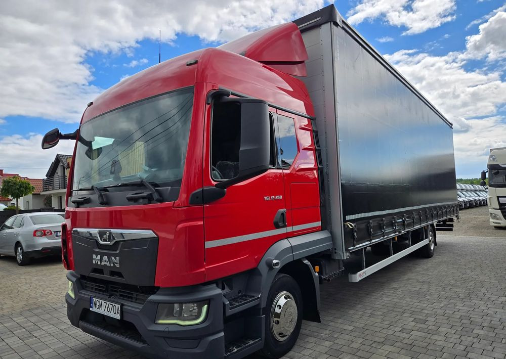MAN TGL 12.250 - Pressukapelli kuorma-auto: kuva MAN TGL 12.250 - Pressukapelli kuorma-auto MAN TGL 12.250 - Pressukapelli kuorma-auto: kuva MAN TGL 12.250 - Pressukapelli kuorma-auto