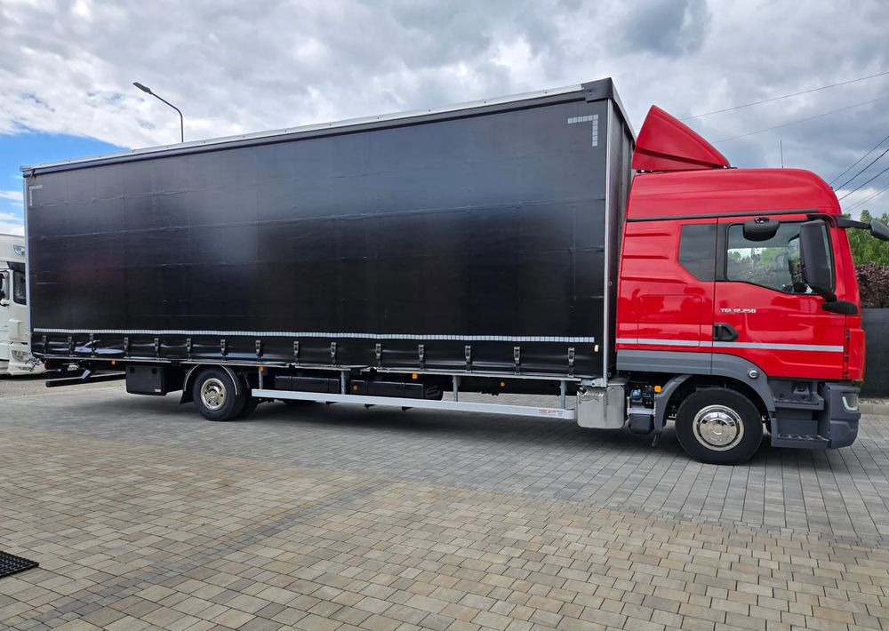MAN TGL 12.250 - Pressukapelli kuorma-auto: kuva MAN TGL 12.250 - Pressukapelli kuorma-auto MAN TGL 12.250 - Pressukapelli kuorma-auto: kuva MAN TGL 12.250 - Pressukapelli kuorma-auto