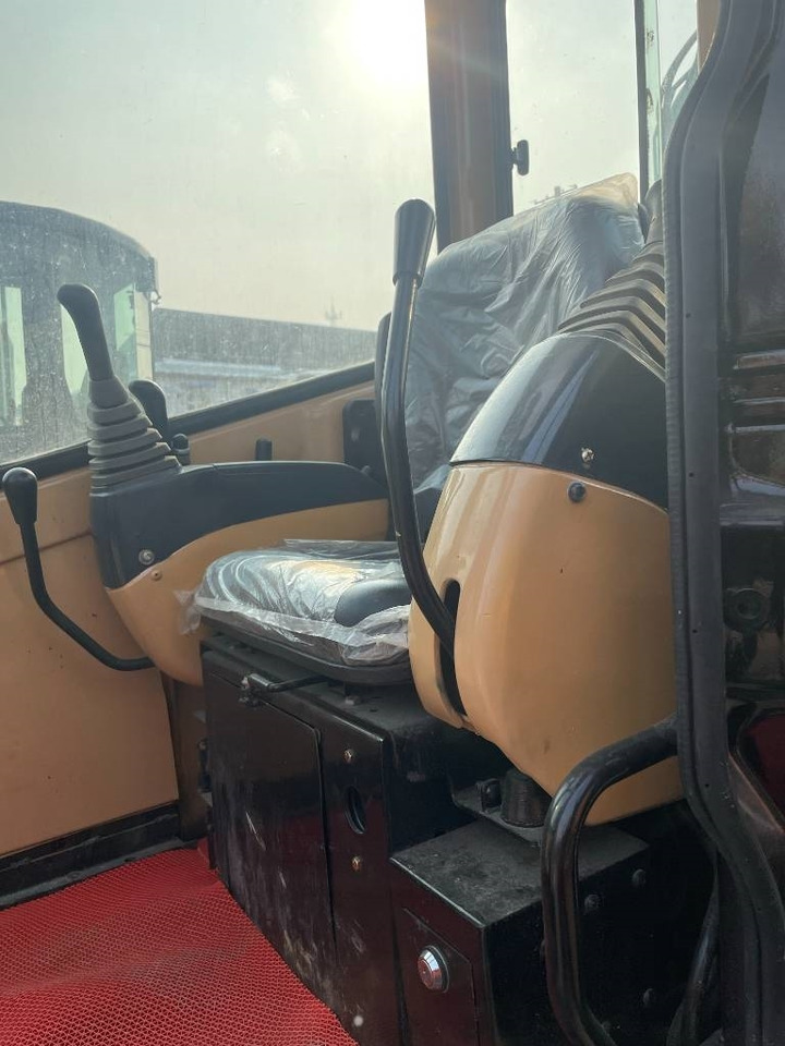 CAT 303 - Minikuormaaja: kuva CAT 303 - Minikuormaaja CAT 303 - Minikuormaaja: kuva CAT 303 - Minikuormaaja