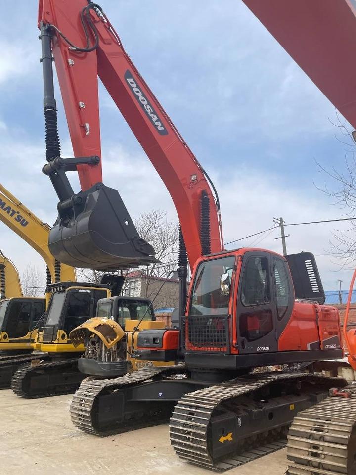 Doosan DX 220 LC-9C - Telakaivukone: kuva Doosan DX 220 LC-9C - Telakaivukone Doosan DX 220 LC-9C - Telakaivukone: kuva Doosan DX 220 LC-9C - Telakaivukone